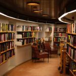 chair beside book shelves